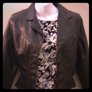 Small Faux leather jacket. Super cute !!!
